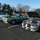 And a classic Camaro convertible on the other side.